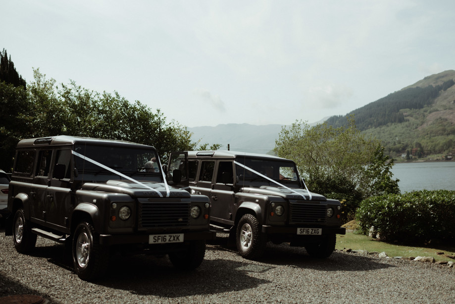 Wedding 4x4 cars with waterside in background, organised by White Heather Wedding & Event Planning Services